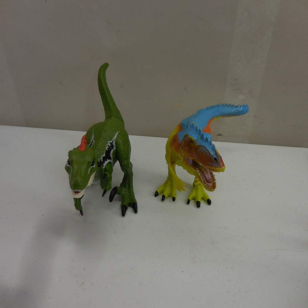 Lot of 2 Dinosaur Action Figures Green Raptor and Multicolored Theropod Toys